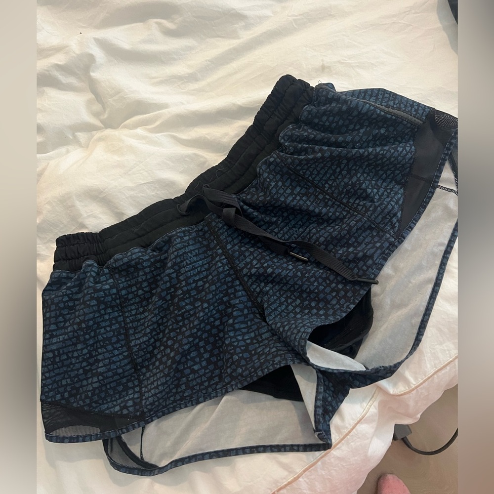 Low-rise Hotty Hot shorts. Blue/black color Size 10, 2.5